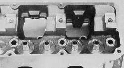 stands for a single-shaft-type rocker arm systems
